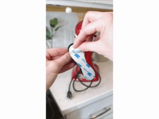Organisateur de cordons d'appareils électroménagers