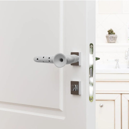 Silicone cover on a door handle protecting the wall behind it from dents