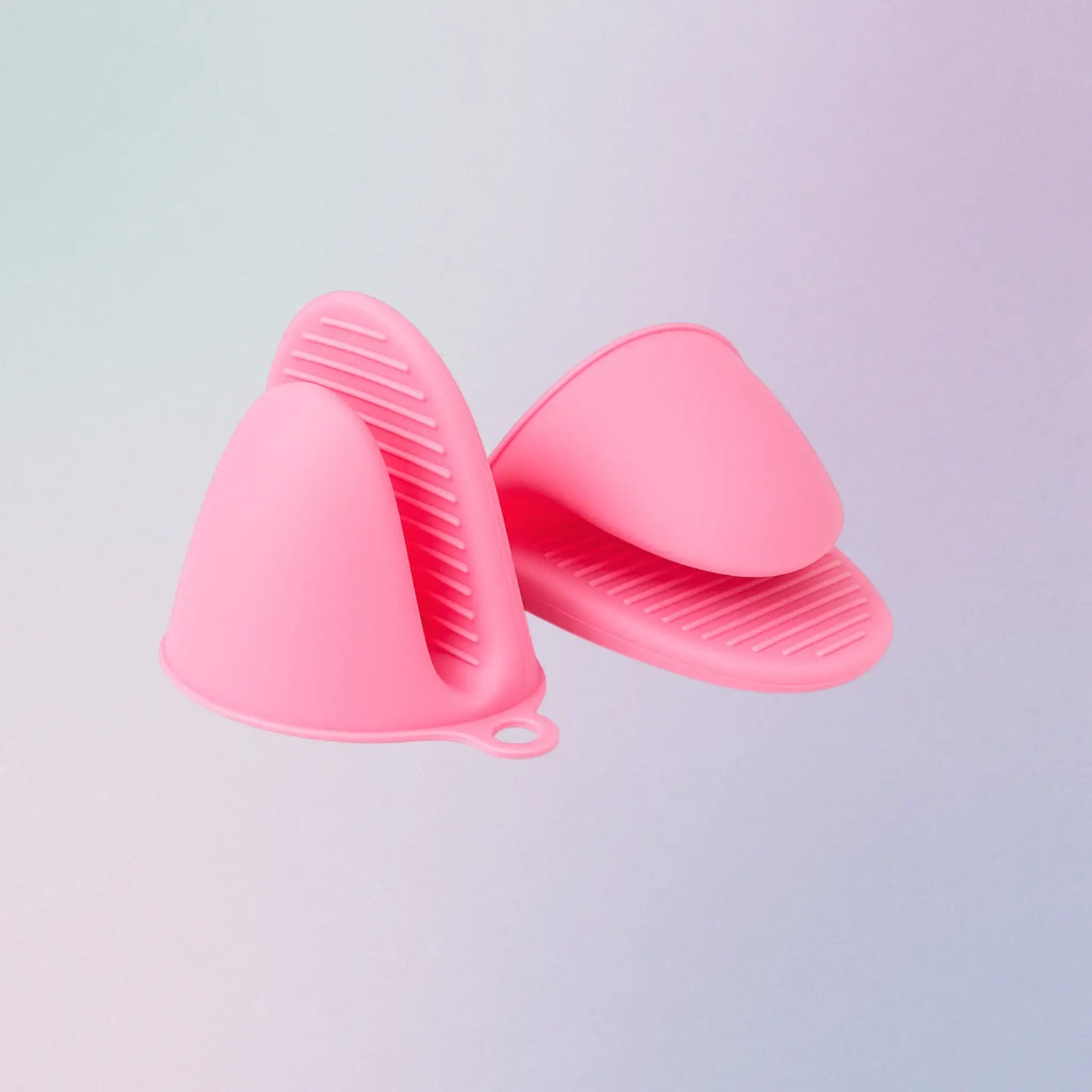Pink silicone kitchen gloves on a light gray background