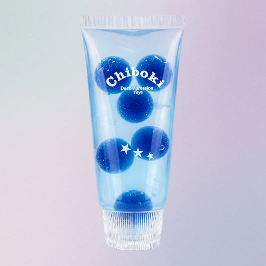 Blue blueberry Chiboki toothpaste squishy, a jelly sensory toy with fruit pieces inside