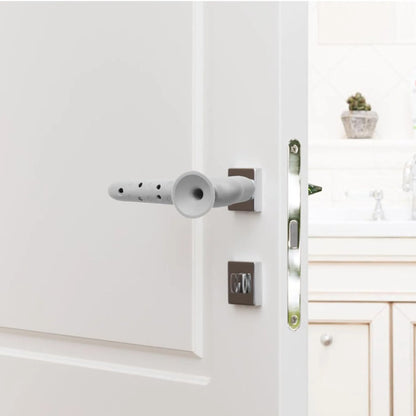 Silicone cover on a door handle protecting the wall behind it from dents