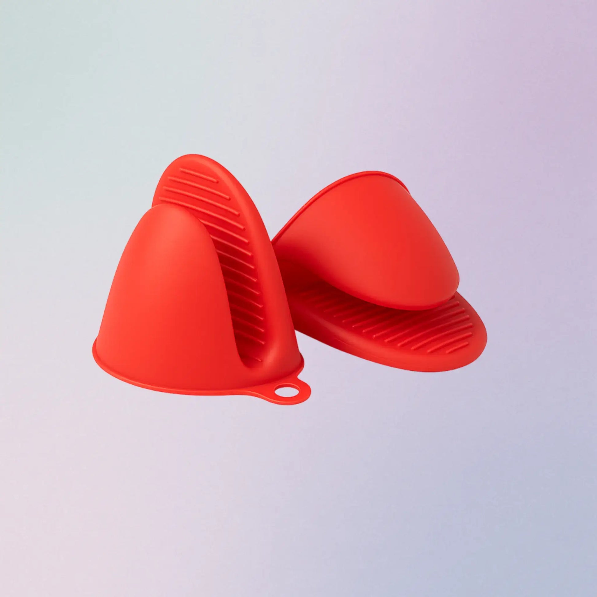 Red silicone kitchen gloves on a light gray background