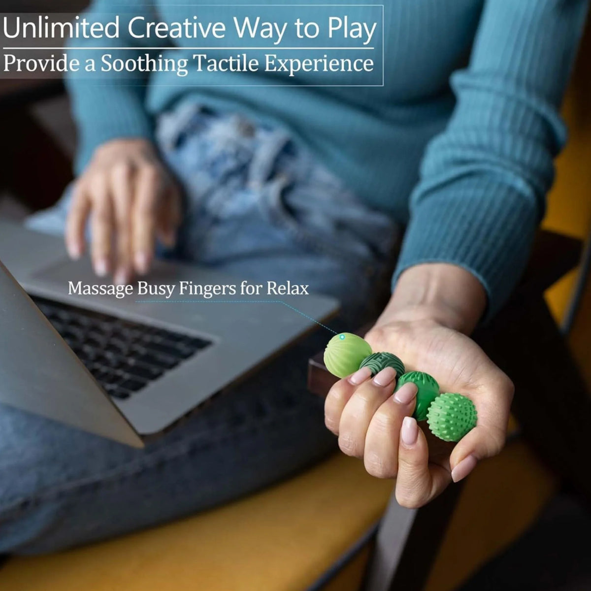 Hand rolling magnetic fidget balls together for focus and calm